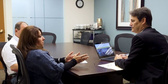 Photo of Jim Droske with Illinois Credit Services clients Photo of Jim Droske with Illinois Credit Services clients