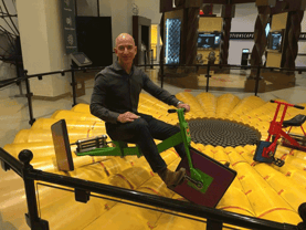 Jeff Bezos Riding The Square-Wheeled Tricycle Jeff Bezos Riding The Square-Wheeled Tricycle