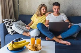 Couple Looking at a Laptop Screen