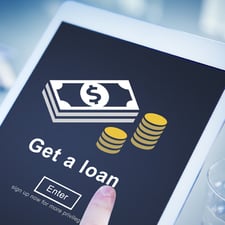 Photo of an online loan application on a tablet Photo of an online loan application on a tablet