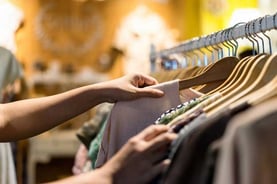 Person Shopping at a Thrift Store Person Shopping at a Thrift Store