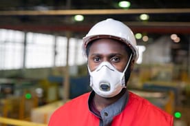Worker Wearing a Face Mask Worker Wearing a Face Mask