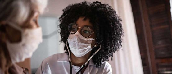 Medical Care Provider Wearing a Face Mask Medical Care Provider Wearing a Face Mask