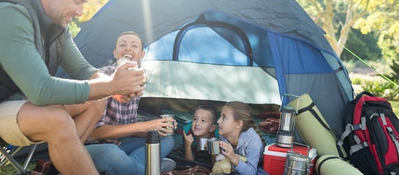 Photo of a family on a camping trip Photo of a family on a camping trip