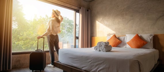 Photo of a woman in a hotel room Photo of a woman in a hotel room
