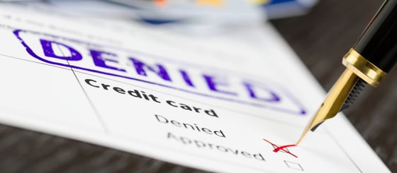 Photo of a denied credit card application. Photo of a denied credit card application.