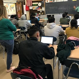 Photo of The Stock Market Game in a classroom Photo of The Stock Market Game in a classroom