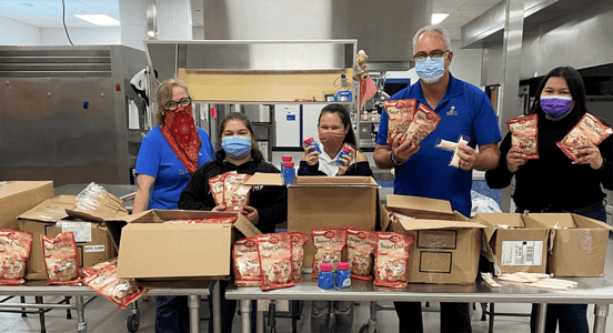 Image of RBFCU event donating baking supplies Image of RBFCU event donating baking supplies