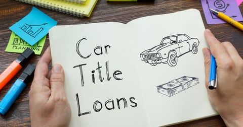 Car title loans is shown on a business photo using the text