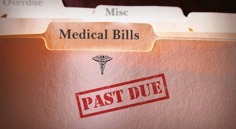 File folders with Past Due Medical Bills text