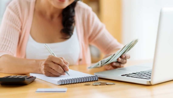 Woman distributing family budget