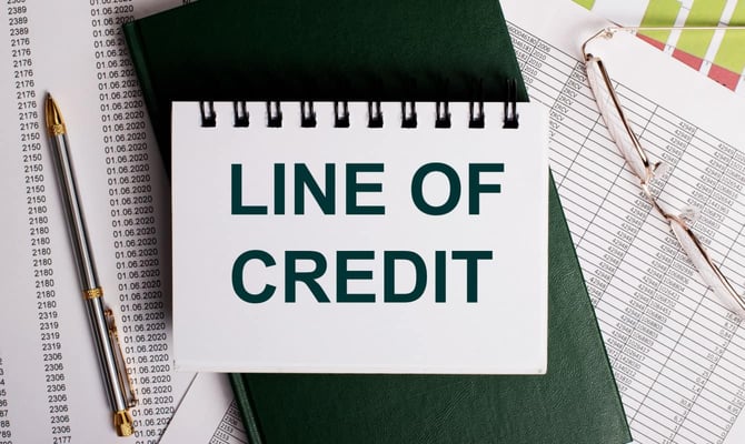 Line of credit printed on a notebook graphic Line of credit printed on a notebook graphic