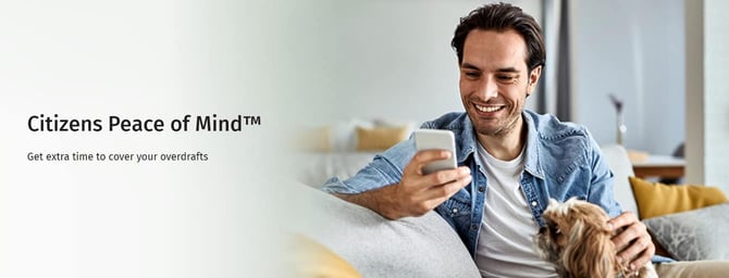 Citizens overdraft ad featuring man with pet and phone Citizens overdraft ad featuring man with pet and phone