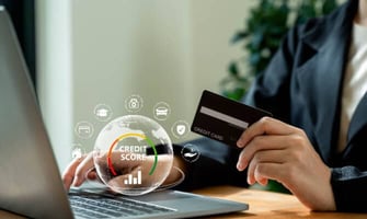 a hand holding a credit card graphic a hand holding a credit card graphic
