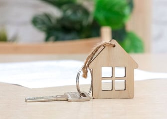 key with a house keychain attached graphic key with a house keychain attached graphic