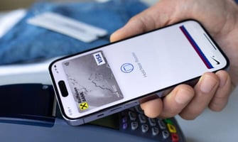 a person paying with apple pay graphic a person paying with apple pay graphic