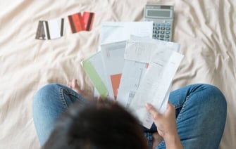a woman holding a stack of bills graphic a woman holding a stack of bills graphic
