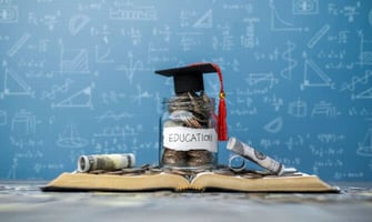 a jar of money labeled for education graphic a jar of money labeled for education graphic