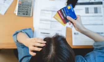 young woman stressed out by credit card debt graphic young woman stressed out by credit card debt graphic