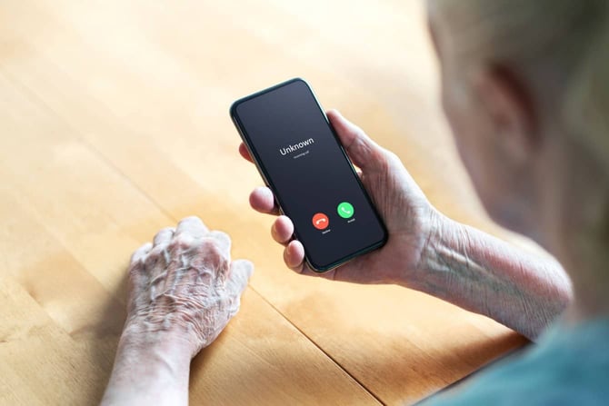 Photo of Senior Receiving a Call from an Unknown Caller Photo of Senior Receiving a Call from an Unknown Caller