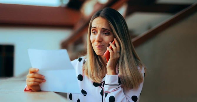 person on phone looking stressed person on phone looking stressed