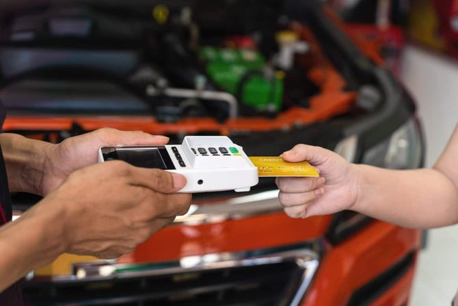 car repair invoice hands holding bill candid car repair invoice hands holding bill candid
