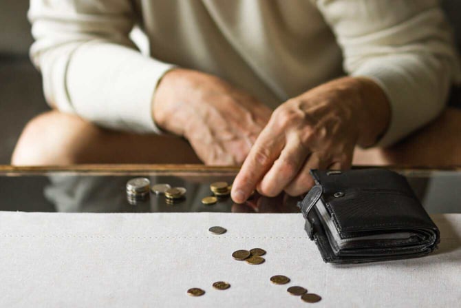 person counting coins person counting coins