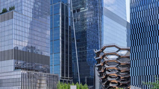 Photo of Hudson Yard development with skyscrapers, the Vessel, and office and apartment buildings in New York City Photo of Hudson Yard development with skyscrapers, the Vessel, and office and apartment buildings in New York City