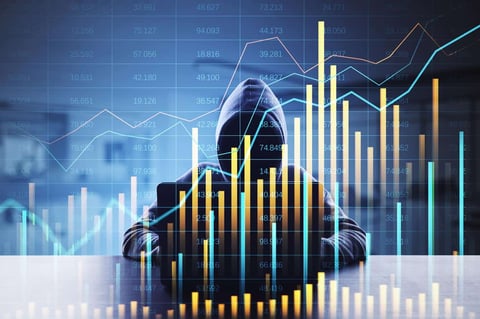 person in hooded sweatshirt with bar charts and numbers in foreground person in hooded sweatshirt with bar charts and numbers in foreground