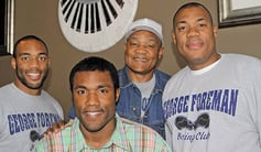 Boxing and grilling George Foreman (second from right) poses with three of his five sons, all of whom are also named George Foreman.