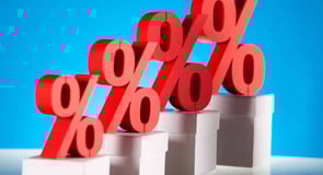 Image of percentage signs increasing to depict interest on a credit card. Image of percentage signs increasing to depict interest on a credit card.