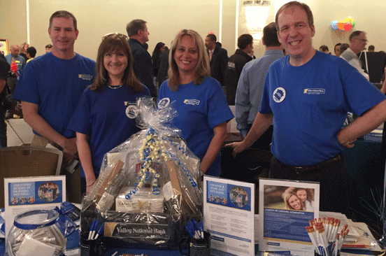 Photo of Valley National Bank employees at a homeownership event Photo of Valley National Bank employees at a homeownership event