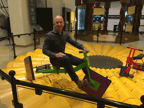 Jeff Bezos Riding The Square-Wheeled Tricycle Jeff Bezos Riding The Square-Wheeled Tricycle