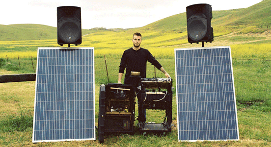 Photo of Sean Cusack with his photovoltaic fueled sound system Photo of Sean Cusack with his photovoltaic fueled sound system