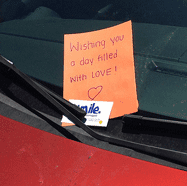 Photo of a Positive Note on a Car Photo of a Positive Note on a Car