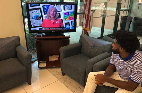 Photo of a Member Watching Tropical TV Photo of a Member Watching Tropical TV